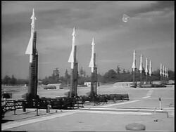B/W 1955 wide shot rows of Nike anti-aircraft missiles in field / near Seattle, WA / newsreel Stock Footage