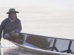 MS fisherman in boat on Mekong River / Vientiane, Laos Stock Footage