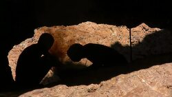 making fire in a cave Stock Footage