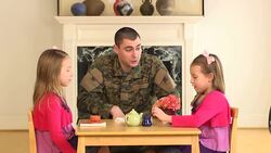 Military Father Playing with His Young Daughters Stock Footage