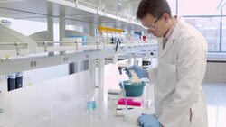 MS Scientist filling centrifuge test tubes with pipette in research laboratory Stock Footage