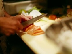 MS Shot of Japanese restaurant in Sao Paulo, Sushi prepared inside VW bus / Sao Paulo, Brazil  Stock Footage