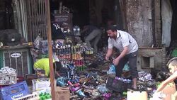 CLEAN : Baghdad suicide car bombing kills at least 14 on Wednesday News Clip