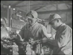 1942: JAPANESE AIR BASE: VS Japanese engineers repairing fighter aircraft engine part in factory, stamping airplane machine gun ammunition, disassembling engine part from fighter plane. World War II, WWII, Pacific Front Instructional Video