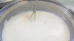 panning: Steamed soil milk with mechanical stir Stock Footage