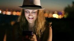 hipster girl using smart phone at night Stock Footage