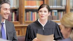 Judge and lawyers talking in meeting Stock Footage