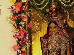 Indian bride printing her hands on the wall  Stock Footage