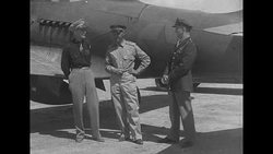 US and Soviet airmen talk in front of US plane given to USSR in Lend-Lease program News Clip