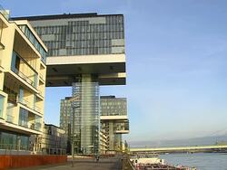 MS LA Shot of Modern buildings at Rheinau Halbinsel with Rhine river / Cologne, North Rhine Westphalia, Germany Stock Footage
