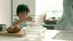 Mother and son baking together Stock Footage
