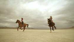 (Slow Motion) Riding Horses in the Dessert 06 Stock Footage