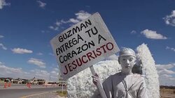 CLEAN : Angels stand outside Chapos prison News Clip