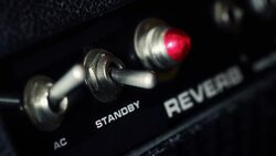 Guitarist Turns on Amplifier and Plays Guitar Stock Footage