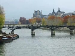 Seine and Cityscape with Pont des Arts and Palais du Louvre, Paris, France Stock Footage