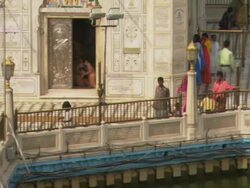 WS PAN People milling around outside of Golden Temple / Amritsar, Punjab, India Stock Footage
