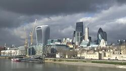 Grey Clouds over the City of London Skyline News Clip