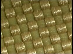 ECU Tracking over Kevlar fabric fibres Stock Footage