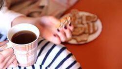 Girl in bed with coffee cup Stock Footage