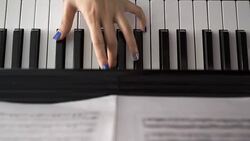 Woman Hands on Piano - Top view Stock Footage