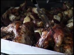 Fork in Cooked Chicken and Potatoes Stock Footage