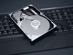 Hard Drive On Top Of Illuminated Keyboard Stock Footage