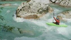 HD: Whitewater Kayaker Paddling Against River Current Stock Footage