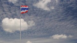 Thailand flag against a blue sky. Part 2 Stock Footage