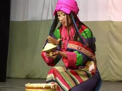 MS TU Woman pretending to take butter out of bucket AUDIO / Dharamsala, Himachal Pradesh, India Stock Footage