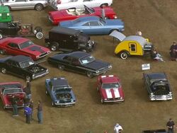 MS AERIAL Shot of US Classic Car Exhibition with people / South Carolina, United States Stock Footage
