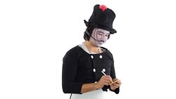 Mime artist taking notes. Stock Footage