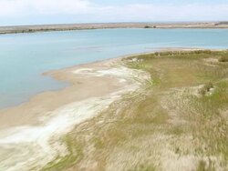 WS AERIAL Shot of river besides desert in boyden state park / Wyoming, United States Stock Footage