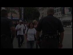 Fans of the late Michael Jackson gathered outside of the memorial service in Los Angeles and his Encino, Calif., home talk about "King of Pop's" legacy News Clip