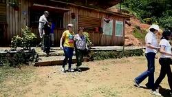 CLEAN : Blind visitors in Colombia try salsa paragliding News Clip