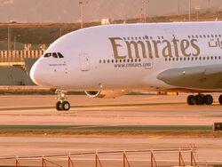 LS Airbus A380 800 super wide body airliner taxi across tarmac at Los Angeles International Airport / Los Angeles, California, USA Stock Footage