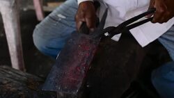 Blacksmith working on metal Stock Footage