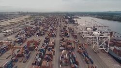 Aerial view of Industrial port with containers ship Stock Footage