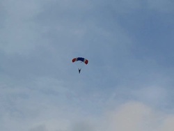 Skydiving in blue sky with clouds. Stock Footage
