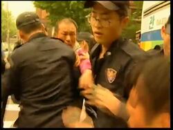 Protesters held after rally against import of US beef Instructional Video