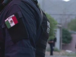 MS ZI ZO Shot of Mexican police officer guards at crime scene AUDIO / Ciudad Juarez, Juarez, Mexico Stock Footage