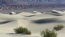 The Mesquite flat sand dunes in Death Valley which is the lowest, hottest, driest place in the USA, with an average annual rainfall of around 2 inches, some years it does not receive any rain at all. Stock Footage