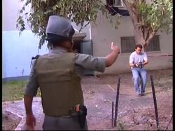 House in Sderot hit by rocket, voxpop News Clip