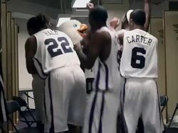 MS eagle mascot and professional basketball team in locker room running out to game / Washington, USA Stock Footage
