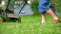 Mowing grass Stock Footage