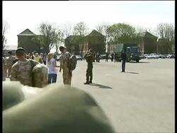 2007 MS TS British soldiers return from Basra to be greeted by families at RAF Uxbridge parking lot on May 4, 2007 / Uxbridge, London, England/ AUDIO Stock Footage