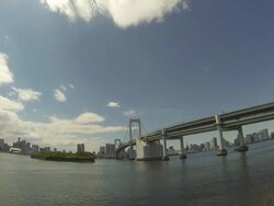 WS PAN T/L View of Rainbow bridge and Tokyo Bay / Odaiba, Tokyo, Japan  Stock Footage