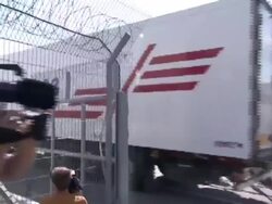 MH17 bodies arrive at Kharkiv Airport by lorry News Clip