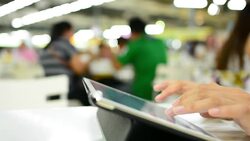 Women typing tablet Stock Footage