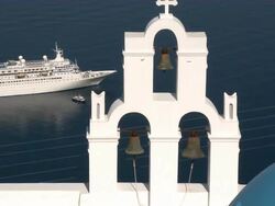 MS ZO Cross and bells at top of church / Santorini, Cyclades Islands, Greece  Stock Footage