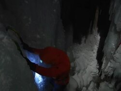 MS Looking down & across on Ice Climber in night with headlamp close to climber  / Ouray,CO,USA Stock Footage